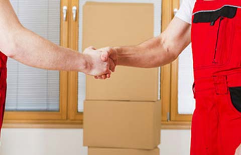 Excellent-Cargo-Movers-and-Packers-Happy-Customer-Handshake